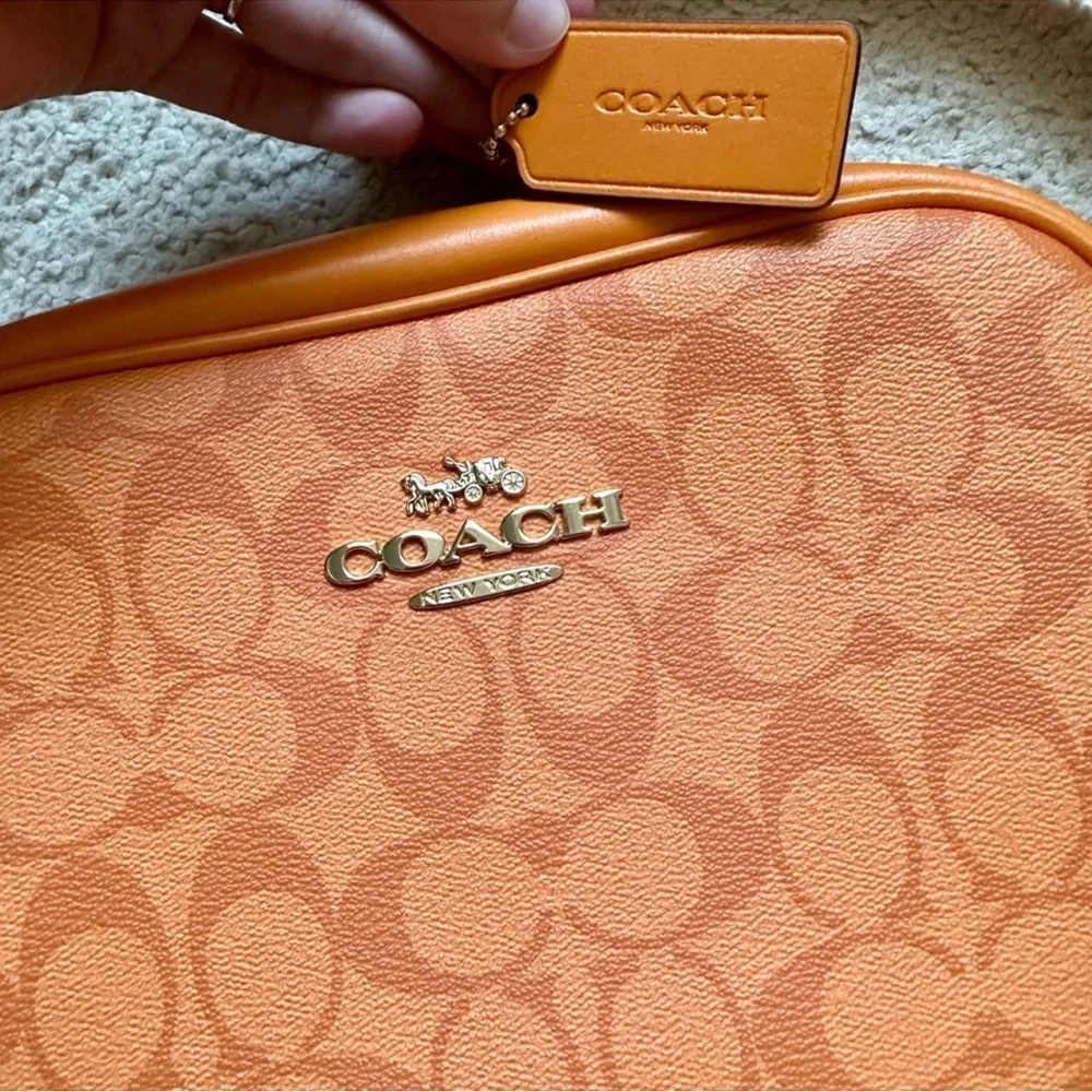 Coach Orange Crossbody Bag with Adjustable Strap and Monogram Pattern - Picture 2 of 7